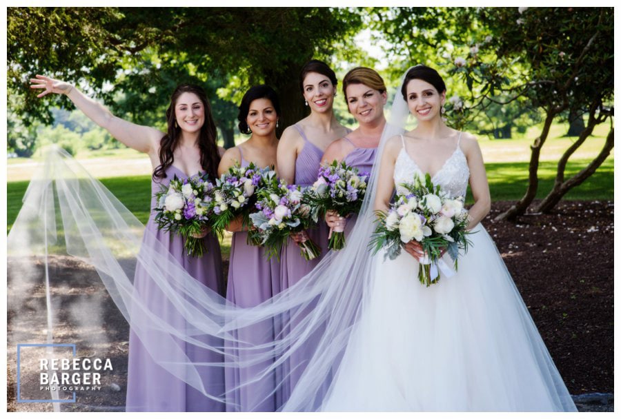 The ladies in lavender with their bouquets by Janssens Market.