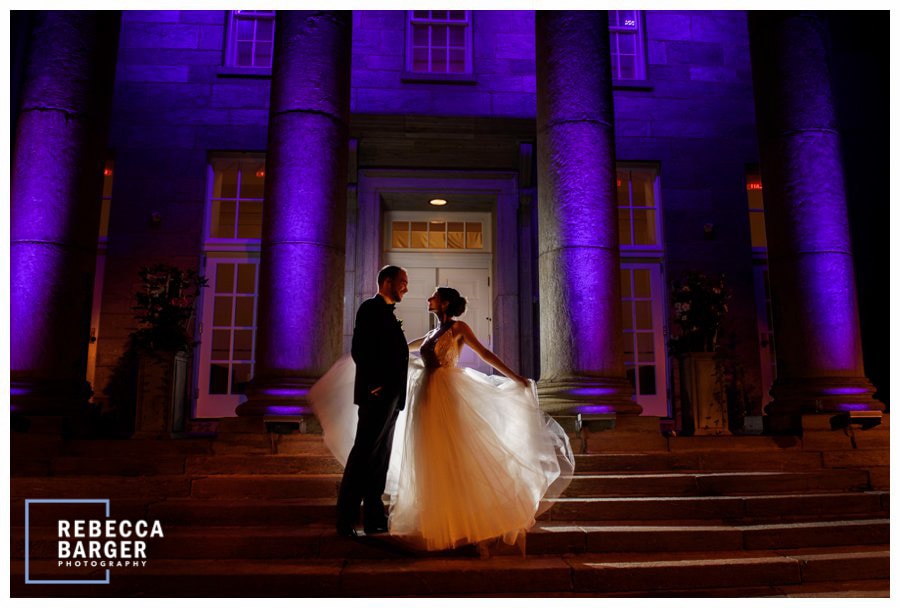 A lovely end of the night on the stairs of the Ellis Preserve with the 1932 columns washed in purple light!