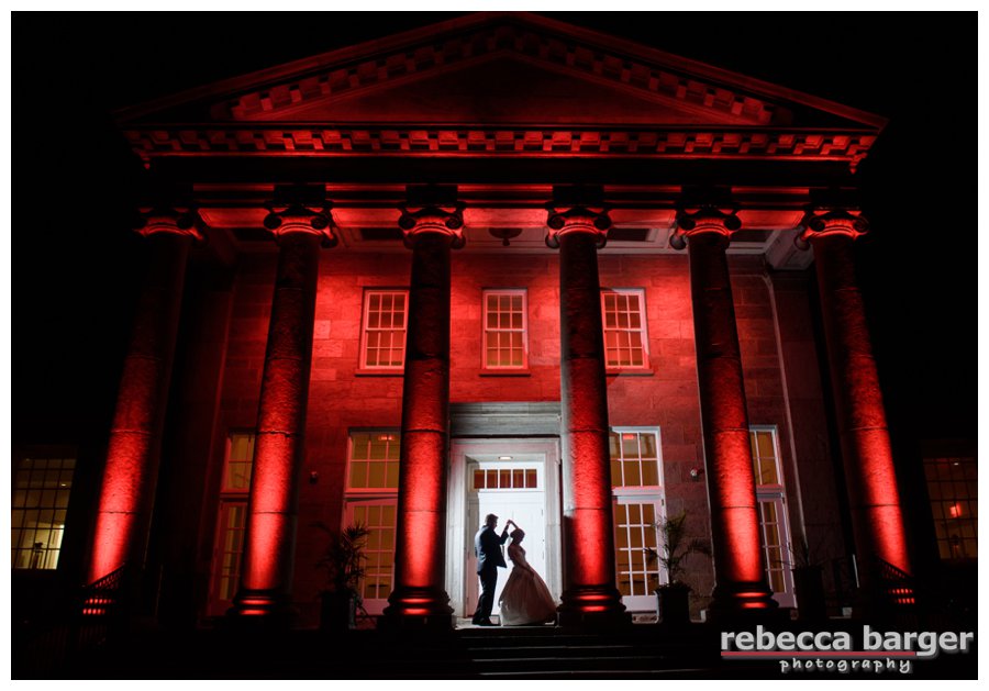Stephanie and Michael share a private dance between the columns in the gorgeous Ellis Preserve.